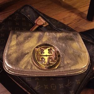 TORY BURCH gold clutch!